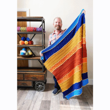 Cablemagoria Knit-Along Blanket in Stylecraft Special Aran by Stuart Hillard - Cinnabar Colourway